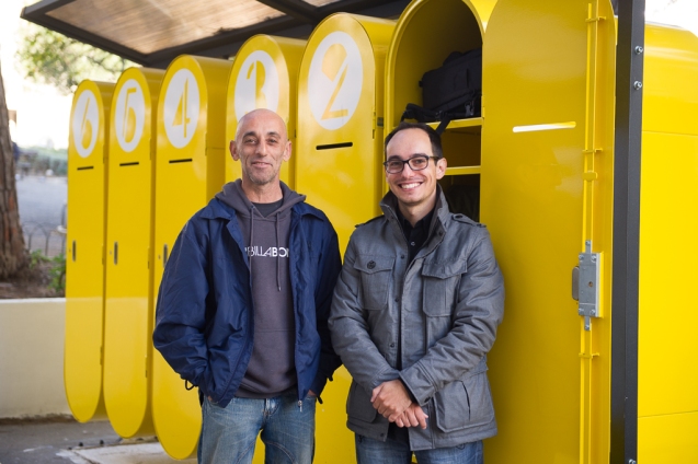 Duarte Paiva (r.) stands with Jorge Toledo in front of the lockers he designed for homeless people in Lisbon to store their treasured possessions. @ Nuno Nunes